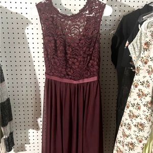 David’s Bridal Knee Length cocktail dress. Burgundy in color. Size 4.